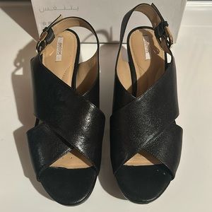 Like new black Geox open toe and back. Used only once